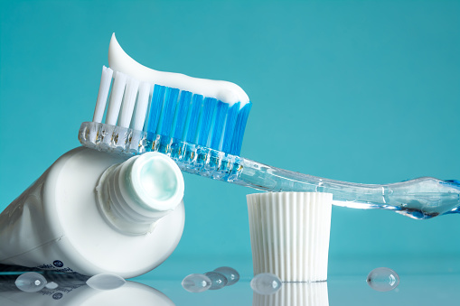 Toothbrush with toothpaste for sensitivity at Cascadia Family Dental in Bend, OR.